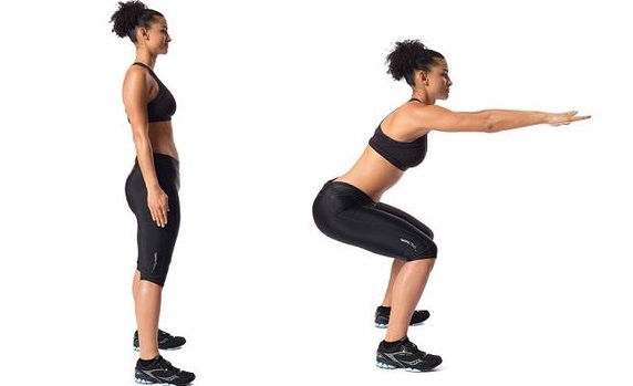 Latihan kaki di gimnasium. Program pelangsingan untuk mengepam otot