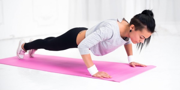 Latihan isometrik. Kompleks untuk kaki, tulang belakang serviks, belakang, tekan. Cara melakukannya di rumah