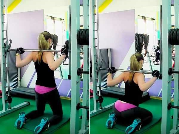 Smith squat cho con gái. Kỹ thuật thực hiện các động tác tập mông, đầu gối, co một chân, cơ tứ đầu đùi, tư thế thẳng lưng rộng hẹp.